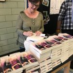 Signing lots of books!